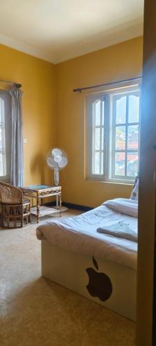 Postel nebo postele na pokoji v ubytování Heritage View Homestay