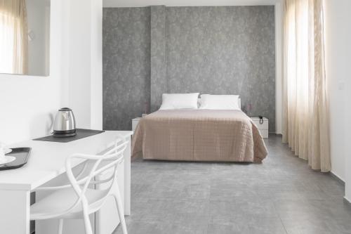 Postel nebo postele na pokoji v ubytování Hotel Bastione