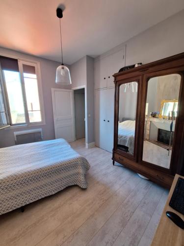 Posteľ alebo postele v izbe v ubytovaní Appartement Pont des Catalans