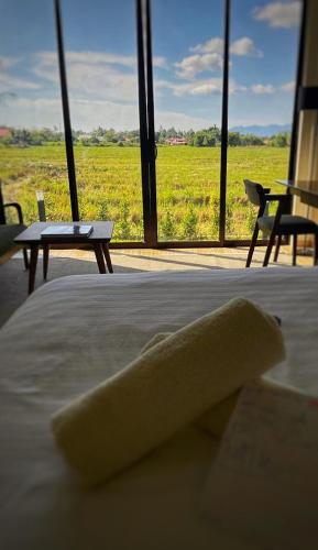 Villa Moo Moo, Pool Villa with Sunset & Paddy Field Viewsにあるベッド