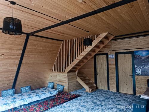 Postel nebo postele na pokoji v ubytování Riverside Guest house Mashkhur