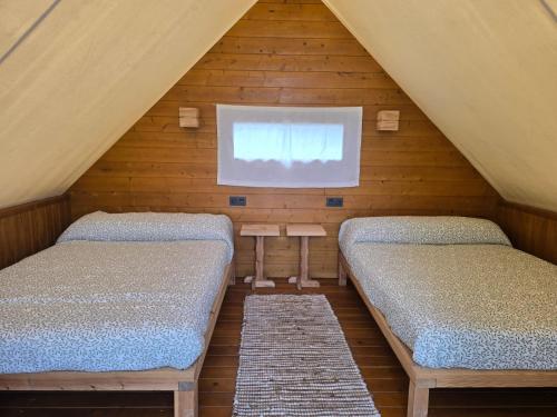 Postel nebo postele na pokoji v ubytování Boho Glamping