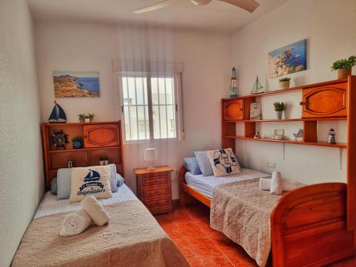 Postel nebo postele na pokoji v ubytování Casa ENCANTOS DEL MAR, La Fabriquilla, Cabo de Gata