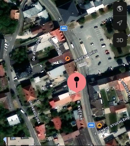 a map of a street with a red circle at Apartmán na náměstí Fryšták in Zlín
