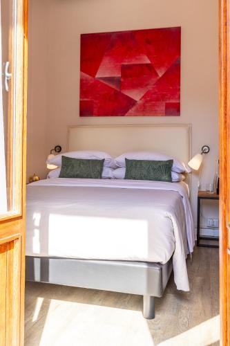 Ένα ή περισσότερα κρεβάτια σε δωμάτιο στο Hotel Il Perlo