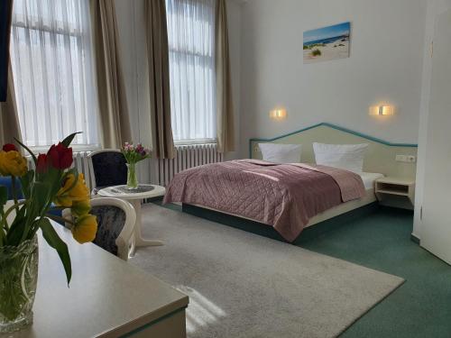 Katil atau katil-katil dalam bilik di Baltisches Haus Pension Moll