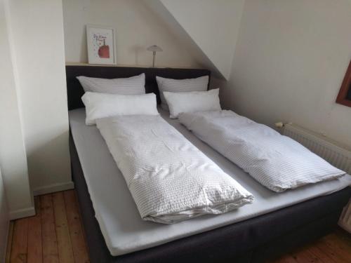 Katil atau katil-katil dalam bilik di Gemütliche, feine Ferienwohnung mit Nähe zum Rhein- Ideal für 2