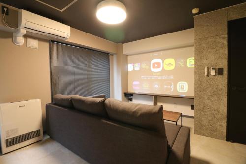 Μια τηλεόραση ή/και κέντρο ψυχαγωγίας στο Maison Sapporo