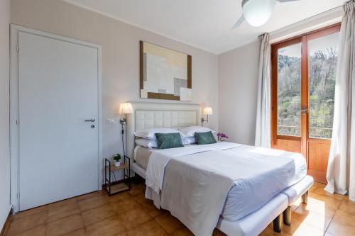Ένα ή περισσότερα κρεβάτια σε δωμάτιο στο Hotel Il Perlo