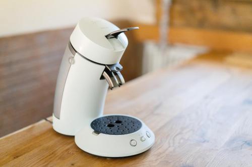 a white mixer sitting on top of a table at Müllerleile Hof in Haslach im Kinzigtal