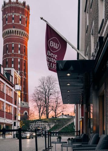 a building with a clock tower in the background at Best Western Plus Kalmarsund Hotell in Kalmar
