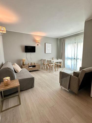 a living room with a couch and a table at DonAna 308 in Lagos