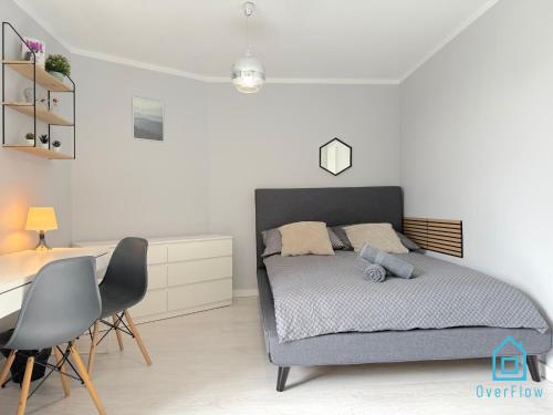 Postel nebo postele na pokoji v ubytování Snake Room 5 min to Old Town Gdańsk