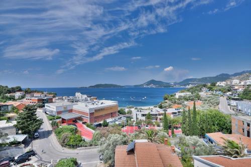 an aerial view of a city and the ocean at Villa Katarina in Budva