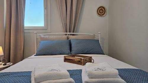 Ένα ή περισσότερα κρεβάτια σε δωμάτιο στο Harmony Villa Milos