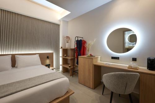Katil atau katil-katil dalam bilik di Athens City Suites