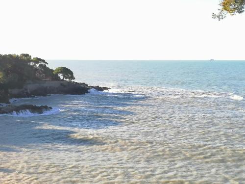a view of the ocean from the beach at Le Rocce Wellness and Fitness, only adults in Lerici