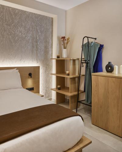 Katil atau katil-katil dalam bilik di Athens City Suites