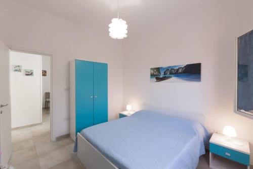 Posteľ alebo postele v izbe v ubytovaní Luna Rossa Salento - Casa Blu