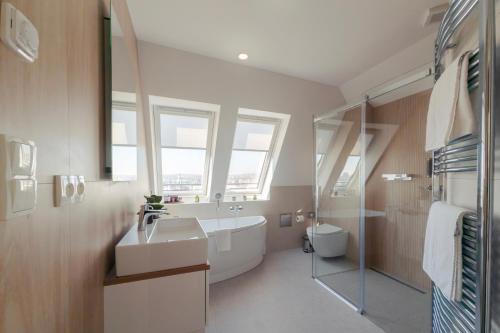 Koupelna v ubytování Hotel Orion