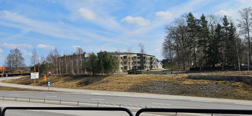 a road with a building on the side of a street at Elme Apartment 2 in Växjö
