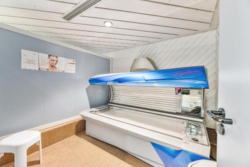 Postel nebo postele na pokoji v ubytování Tonbach 110, Schwimmbad, Sauna, Solarium, Balkon