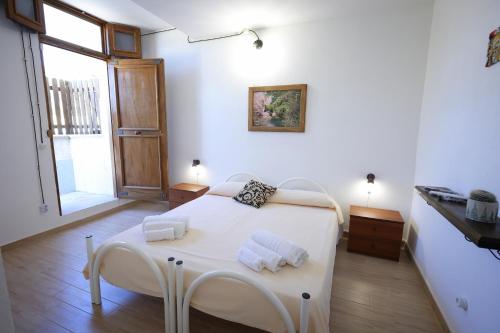 Postel nebo postele na pokoji v ubytování Villa Monte Sereno