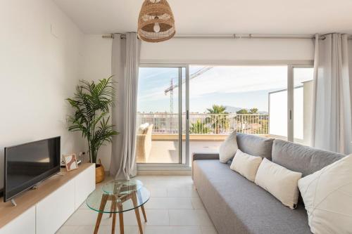 Ático con terraza y vistas al mar