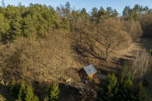 an aerial view of a house in a forest at Srub Pod Lípou - Skryje in Skryje