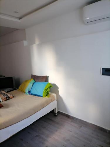 Llit o llits en una habitació de Studio Sahloul