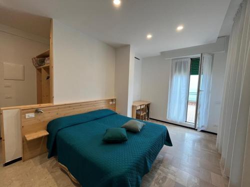Postel nebo postele na pokoji v ubytování Hotel Valentino