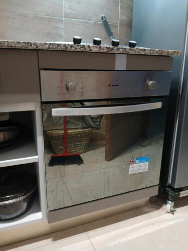 a kitchen counter with a sink in a kitchen at Tanger Beach coralia in Tangier