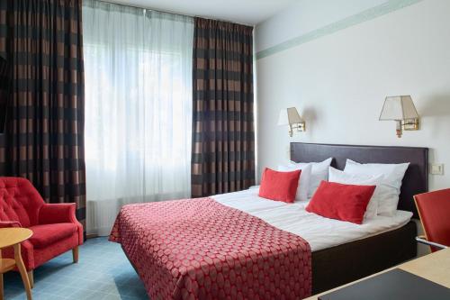 Ένα ή περισσότερα κρεβάτια σε δωμάτιο στο Original Sokos Hotel Alexandra Jyväskylä