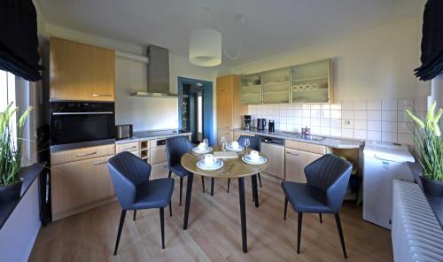 Kuchyň nebo kuchyňský kout v ubytování Ferienwohnung am Schwimmteich 3
