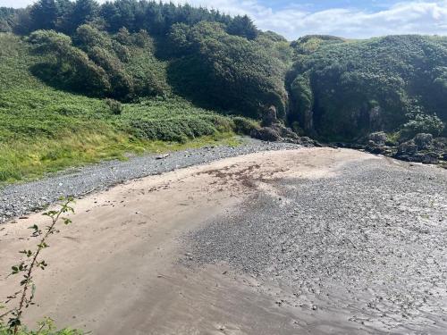 a dirt road in the middle of a mountain at Cosy Holiday Home Portpatrick in Portpatrick