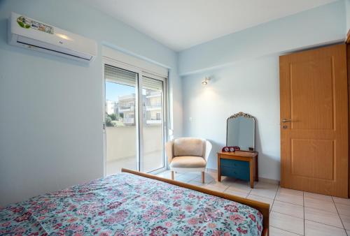 Ένα ή περισσότερα κρεβάτια σε δωμάτιο στο Rodanthi Apartment