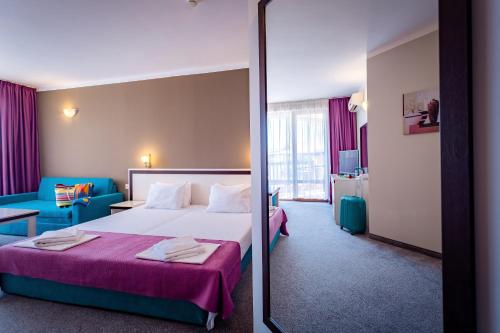 Ένα ή περισσότερα κρεβάτια σε δωμάτιο στο Hotel Oasis Del Mare