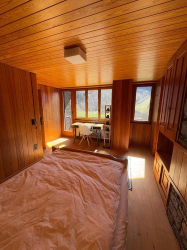 Postel nebo postele na pokoji v ubytování Private 3-story villa in Val calanca, Rossa