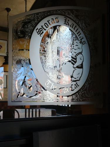 a sign for a restaurant that says bernal island with art at Hotel Reja, a Member of Design Hotels in Klaipėda
