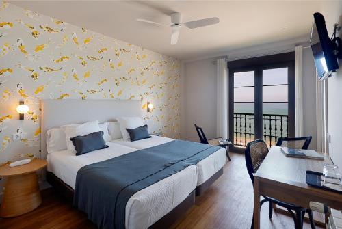 Katil atau katil-katil dalam bilik di Hotel Ribadesella Playa