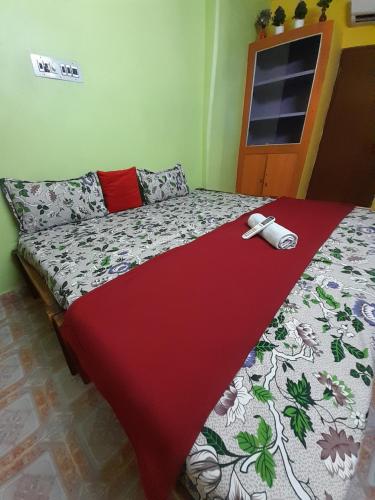 Katil atau katil-katil dalam bilik di Sea Birds Guset House