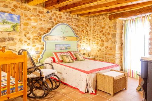 Postel nebo postele na pokoji v ubytování La Cantonada - Casa rural