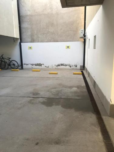 an empty parking lot in a parking garage at Paola in Trelew