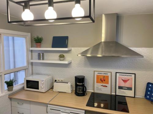 Η κουζίνα ή μικρή κουζίνα στο O Muciño, entre el mar y el Tecla