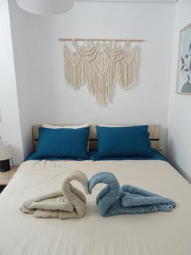 Ένα ή περισσότερα κρεβάτια σε δωμάτιο στο Secret Nest