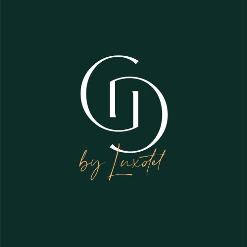 a letter d logo in white on a green background at La Garoupe-Gardiole Boutique Hotel in Antibes