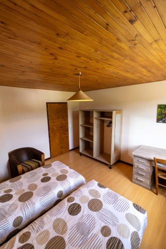 Gîte "La Partie de Bise", 12 personnesにあるベッド