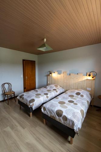Gîte "La Partie de Bise", 12 personnesにあるベッド