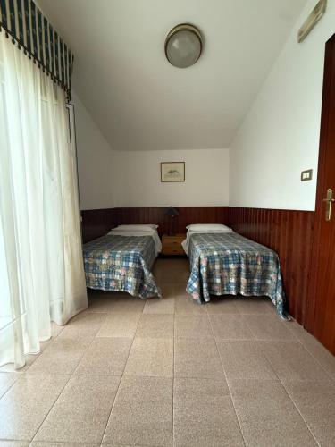 Ένα ή περισσότερα κρεβάτια σε δωμάτιο στο Cristal Hotel