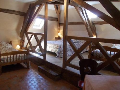 Postel nebo postele na pokoji v ubytování Auberge du Morvan